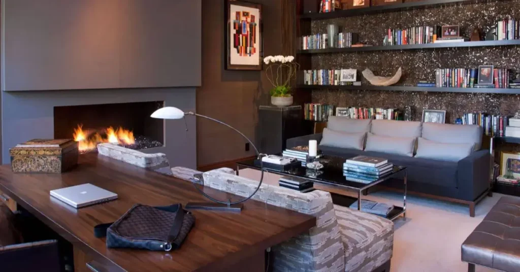 woody office with fireplace